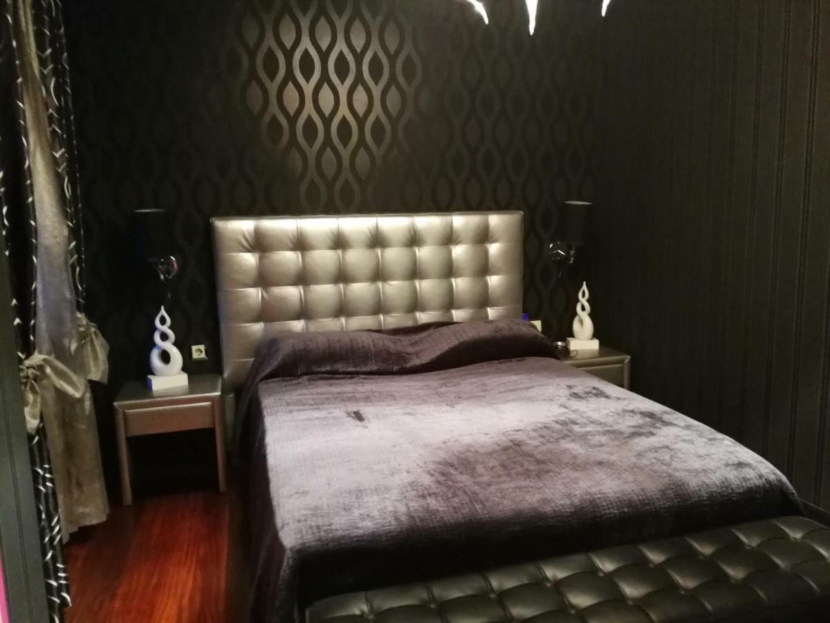 Habitación Con Garage Quarto em Acomodações Particulares